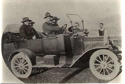 Ken Mitchell and others in car, c.1920's