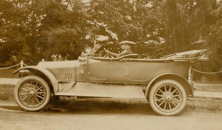 2 men (unidentified) in 'touring' car - Resource cover image