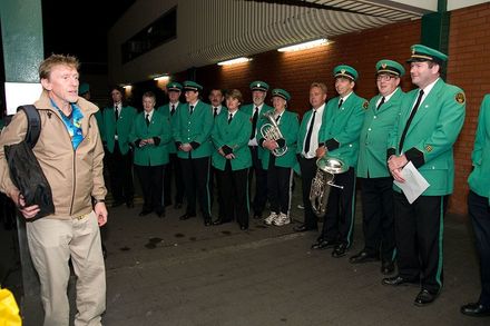 Phil Dadson and members of the Levin and Districts Brass Band outside New World - Resource cover image
