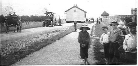 Moving building to Levin School, 1904