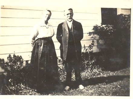 Mr & Mrs Dean in garden, Devon Street, Levin, c.1920