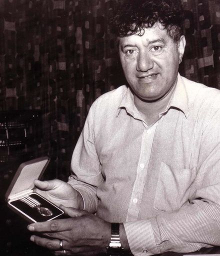 Albert Taylor with medal, 1990
