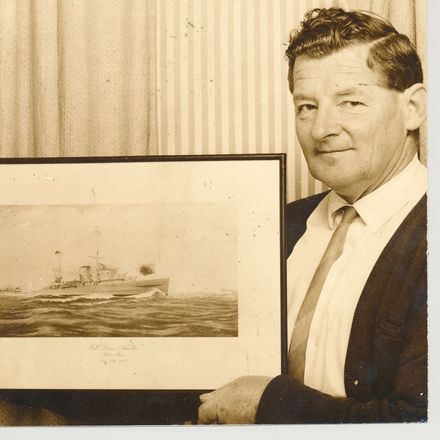 Mr Gallagher & photograph of HMNZS 'Achilles', 1969