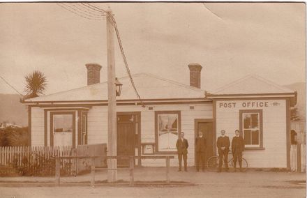 Four men in front of Shannon Post Office, c.1910