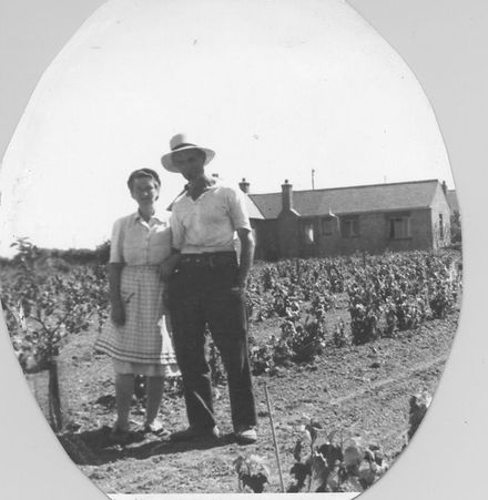 Couple in vegetable garden. - Resource cover image