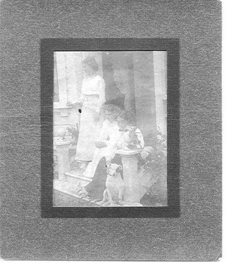 Three Unidentified Women With Dog on House Steps