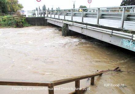 Flood 78     A swollen stream threatens the Pioneer Highway bridge out of Palmerston North  Photo Ros Powel