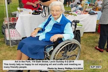 HJP 0421  Art in the Park, 119 Bath Street, Levin Sunday 9-2-2014   This lovely lady so happy to out enjoying art and crafts and meeting so many friendly people. - Resource cover image