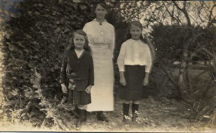 Unidentified Young Woman With Two Girls