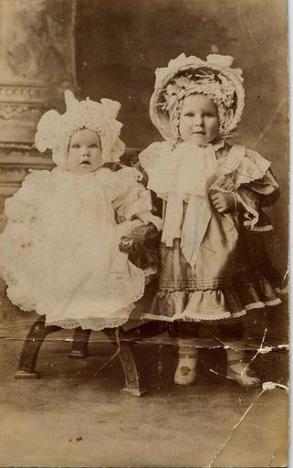 2 little girls, in studio, possibly late 19th century