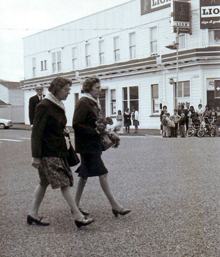 Vera Claridge and Margaret Donnelly about to lay Red Cross wreath, Anzac Day mid 1970's