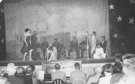 Unidentified show - military scene in eastern cafe