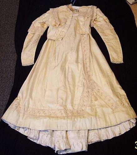 Cream silk and lace wedding outfit. - Resource cover image