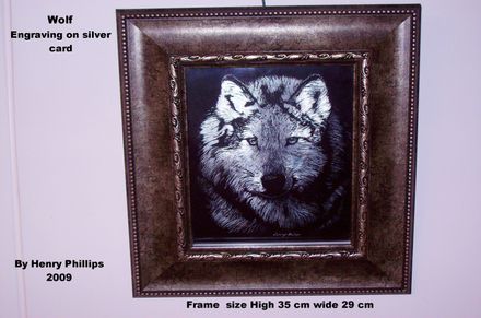 Wolf engraving on silver card