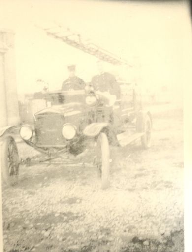 Tom Sunley driving new Fire Engine, c.1920