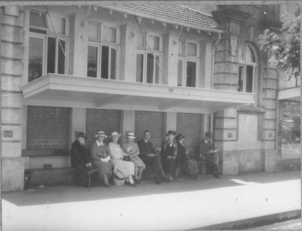 Group seated outside old Levin Library
