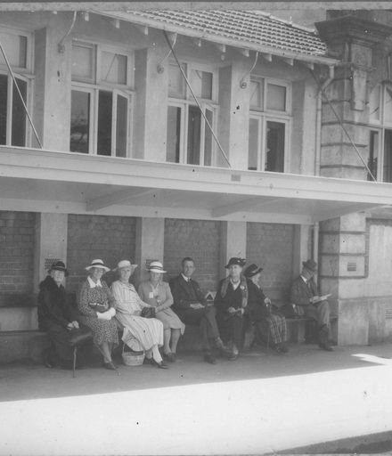 Group seated outside old Levin Library