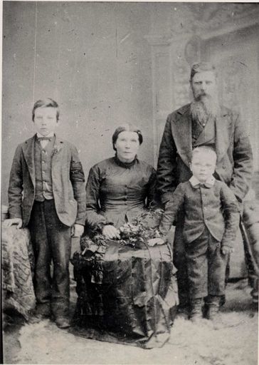Family of 4 (unidentified) in studio