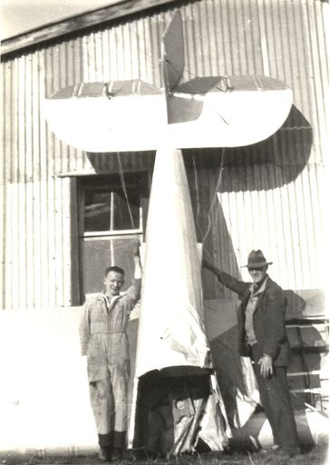 Jack Butler and Bill Harding with Jack Butler's plane, Levin