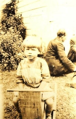 Child on a home made rocking horse?