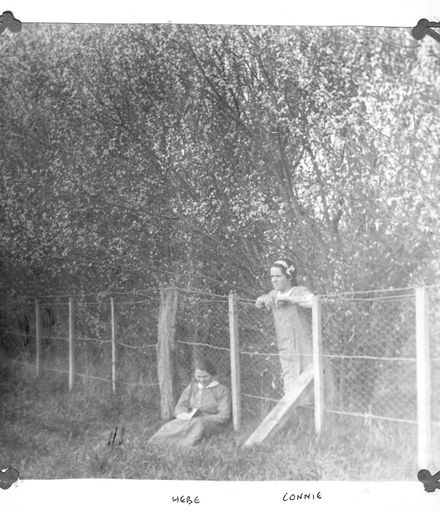 Hebe and Connie Blackburn beside fence