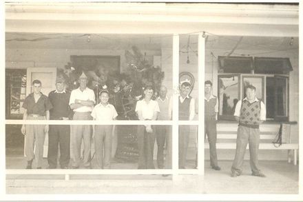 Group of young men on verandah at Kimberley, Christmas / New Year