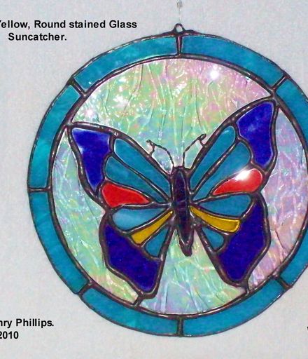 Blue Red Yellow butterfly on round backing
