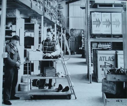 Arthur How & Brian Fitzgerald in warehouse at H.E.P.B. depot