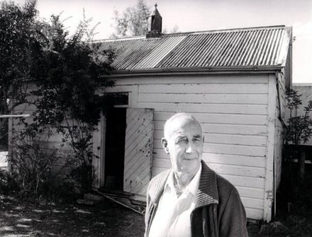 Mr F.C. 'Don' Cole outside old lock-up (jail), Ballance Street, 1987
