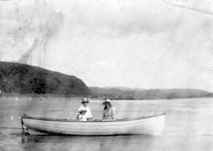 Unidentified group (2 women & child) in dinghy at Plimmerton, 1920's
