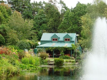 House from behind fountain Garden 7