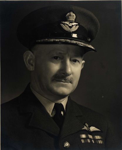 Group Captain T. W. White