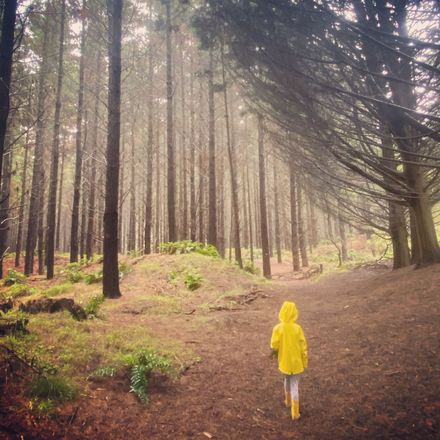 Girl in raincoat at Waitārere forest - #CaptureYourHorowhenua