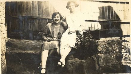 Two ladies seated outside in a garden. - Resource cover image