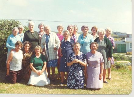 Group of ladies posing on lawn