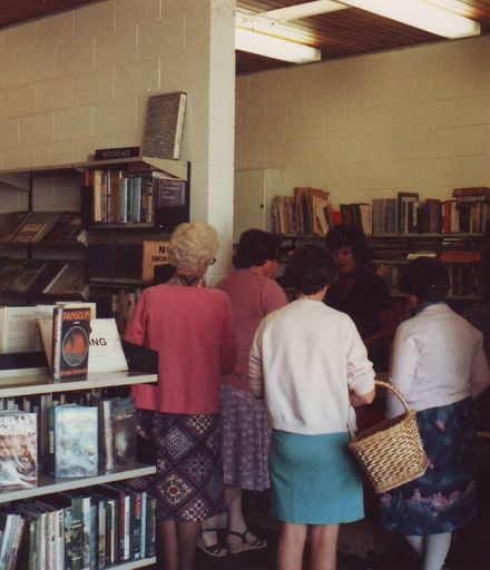 Another view of borrowers at issues desk, Shannon Library, 1981