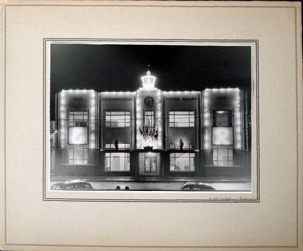 H.E.P.B. building lighted at night with special decorations