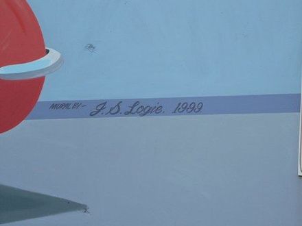 Nice wall painting on wall of Smith Automotives, painted by J S Logie in 1999.