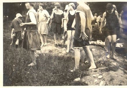 Girls in bathing costumes and barefeet