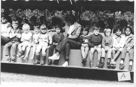 Children & teachers on a tour of the orchards at Summerland
