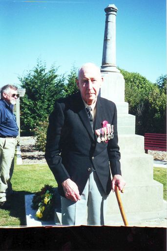Mr Don Cole in front of Percy Nation Memorial, Anzac Day 2001