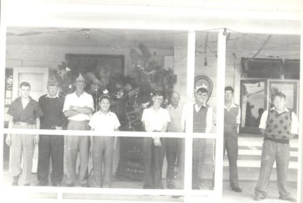 Group of young men on verandah at Kimberley, Christmas / New Year