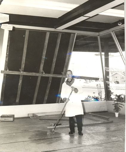 Showroom window damaged by storm, 1969 - Resource cover image