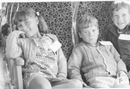 Children seated on bus