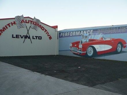 Nice wall painting on wall of Smith Automotive painted by J. S. Logie 1999.