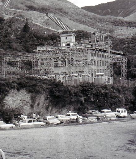 Mangaore Powerhouse with vehicles on roadside downstream, c.1973