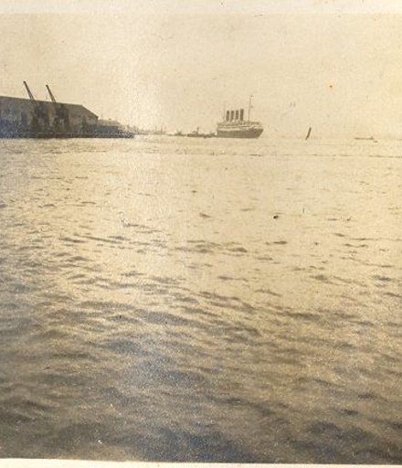 Ocean view with steamship in front of wharf