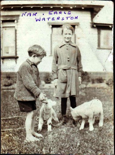 Miss Nan and Earle Waterston with 2 pet lambs, 1920's