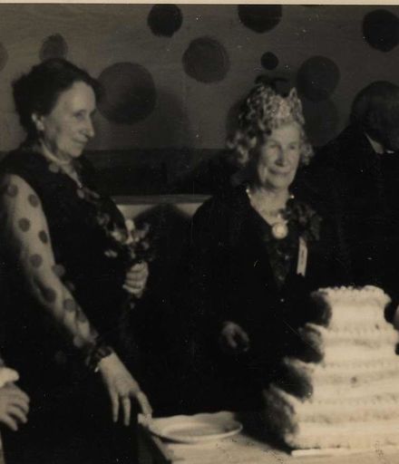 Miss Bowen & others with cake
