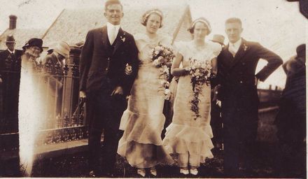 Unidentified wedding group outside unknown church